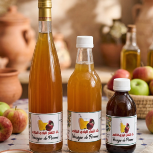 "سر الطبيعة في كل قطرة: خل تفاح بلدي خالص 100%"